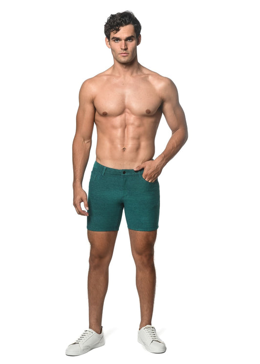 Teal-colored loopback stretch knit slim-fit denim shorts with five-pocket design and button closure