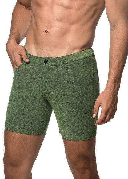 Loopback stretch knit short in green with textured fabric button closure and side pockets for casual wear