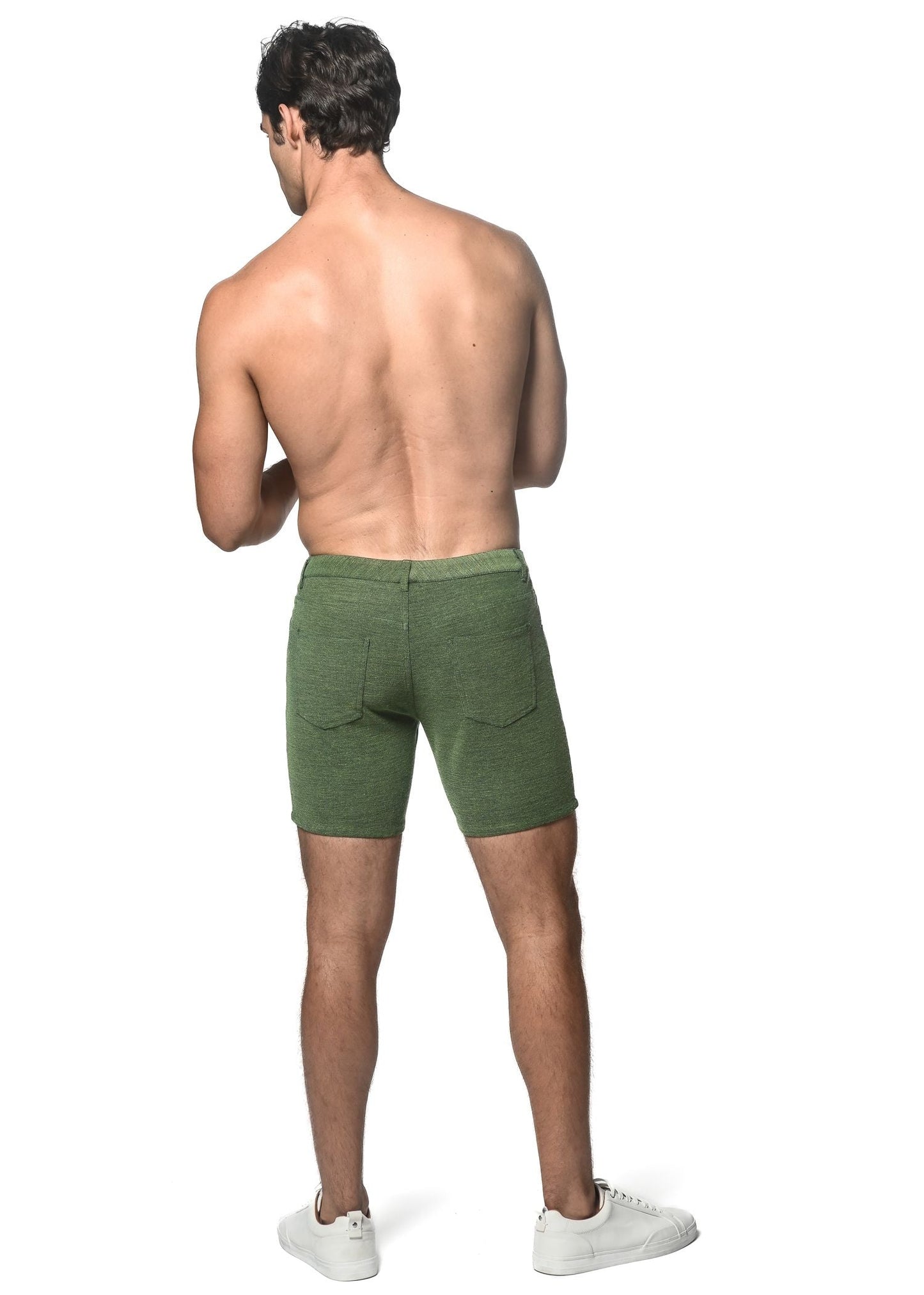 Olive green loopback stretch knit shorts textured fabric with rear pockets shown from the back side