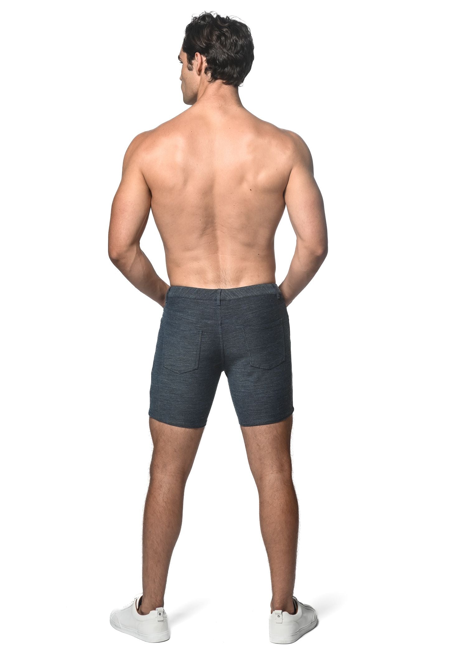 Dark blue loopback stretch knit shorts with classic fit shown from back featuring two rear pockets