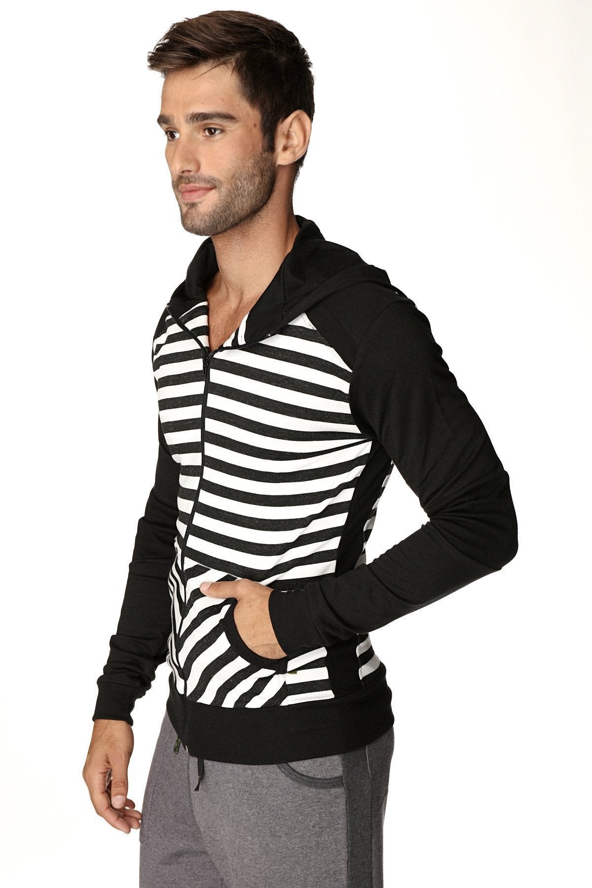 Limited edition form-fit crossover yoga track performance fleece hoodie with black and white stripes and solid black sleeves