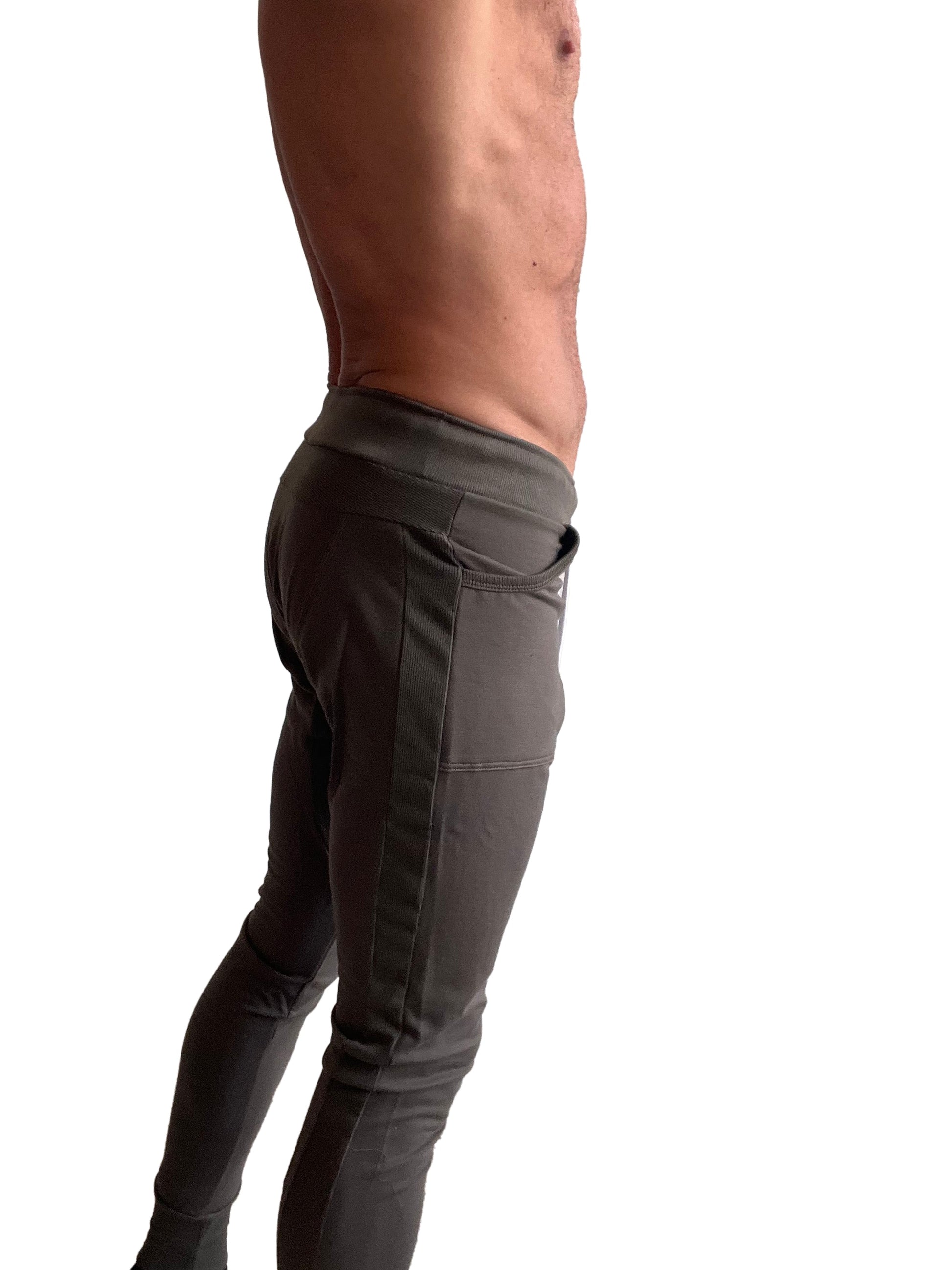 Dark gray long cuffed jogger and yoga sweat pants with slim fit and side pockets designed for athletic use
