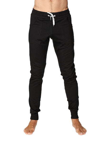 Long cuffed jogger and yoga sweat pants in black with white drawstring waistband and elastic cuffs for comfort