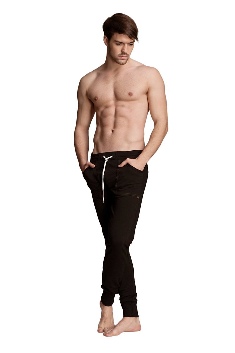 Long cuffed jogger and yoga sweat pants in black with white drawstring and subtle side pockets for comfort and style