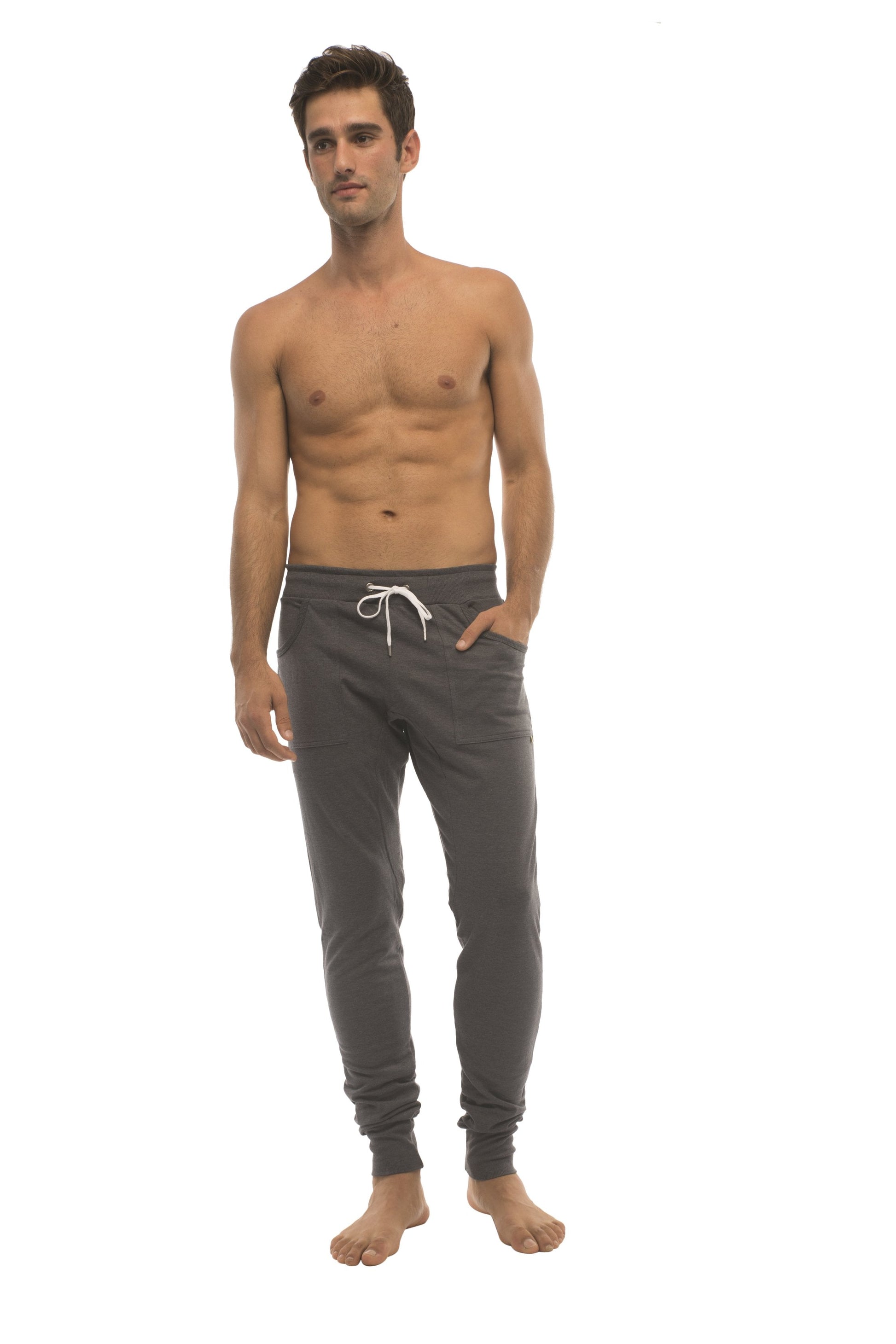 Dark gray long cuffed jogger and yoga sweat pants with white drawstring waistband and elastic cuffs for comfort