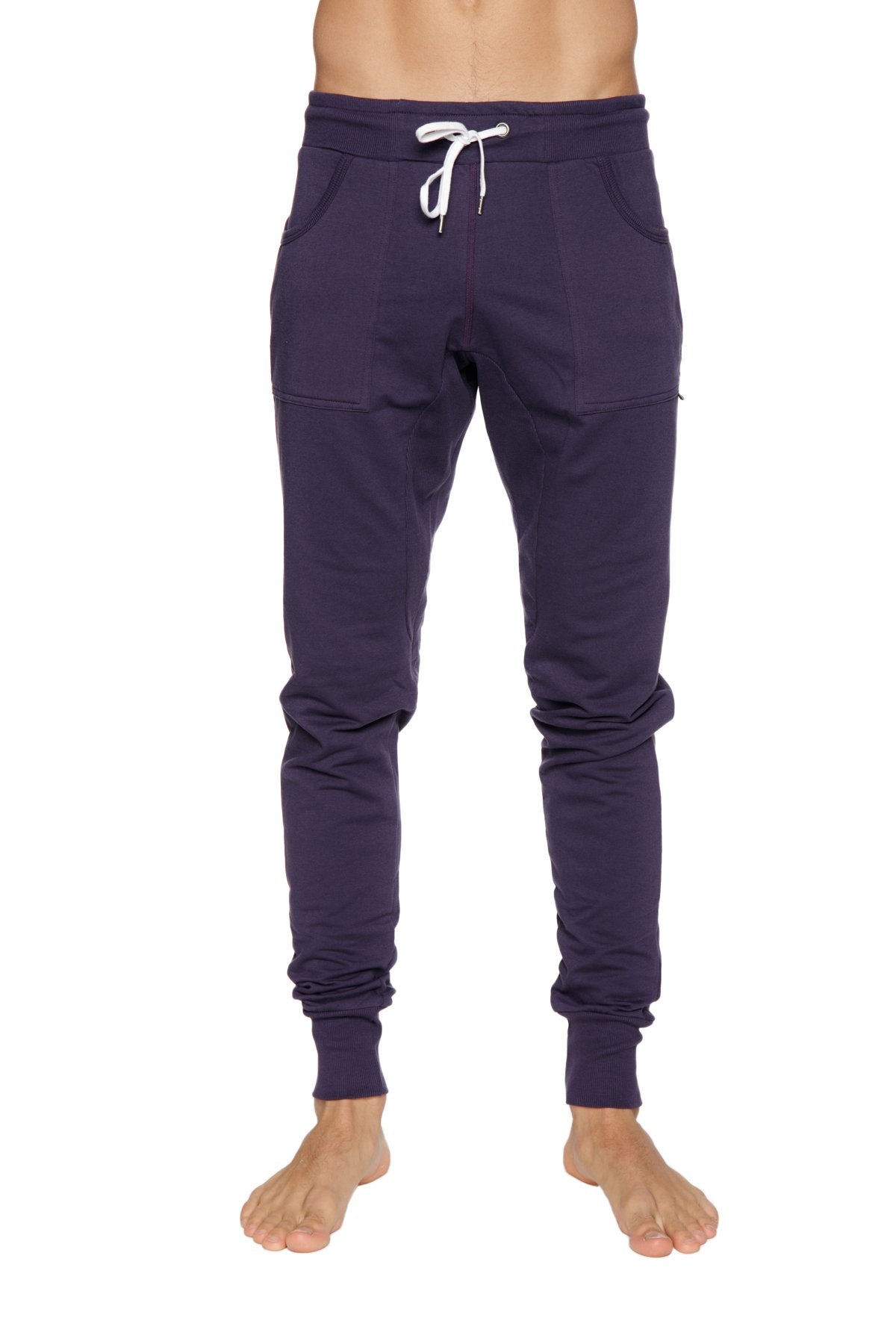 Long cuffed jogger and yoga sweat pants in navy blue with white drawstring waistband and elastic cuffs
