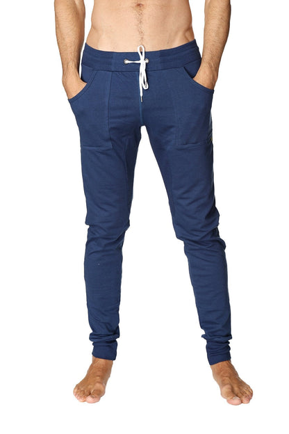 Navy blue long cuffed jogger and yoga sweat pants with white drawstring and side pockets made of soft fabric