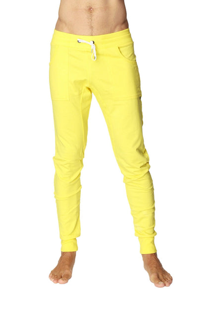 Long cuffed jogger and yoga sweat pants in bright tropic yellow with white drawstring and elastic cuffs for comfort