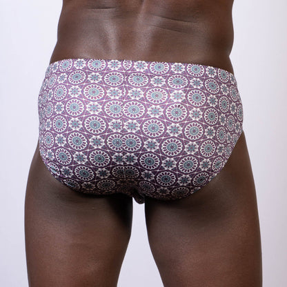 Mandala swim brief purple and teal geometric floral patterned swim briefs for men in stretchy fabric