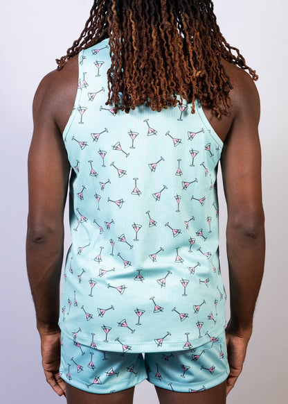 Light blue tank top with a repeating pattern of pink and black martini glasses called martini print tank