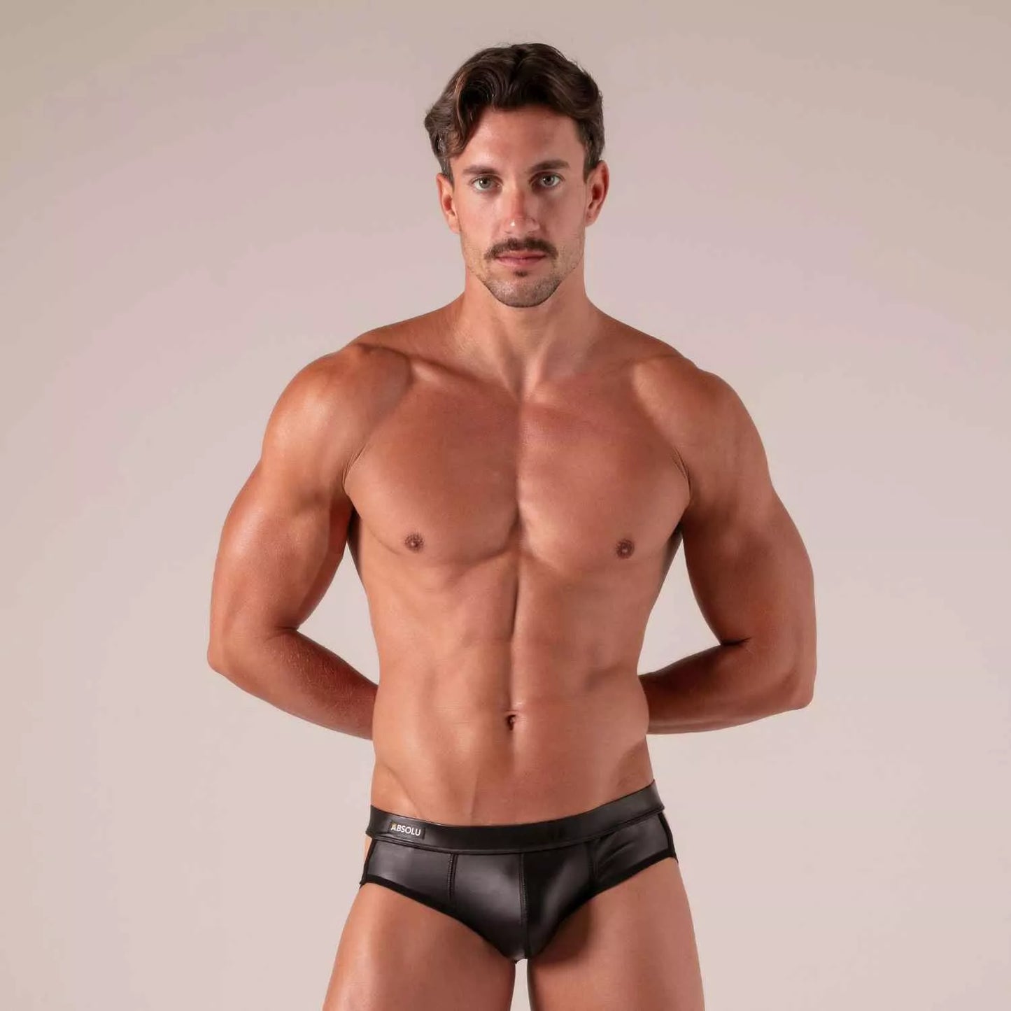 Black leather master straps jock brief with sleek form-fitting design and abscu embroidered waistband