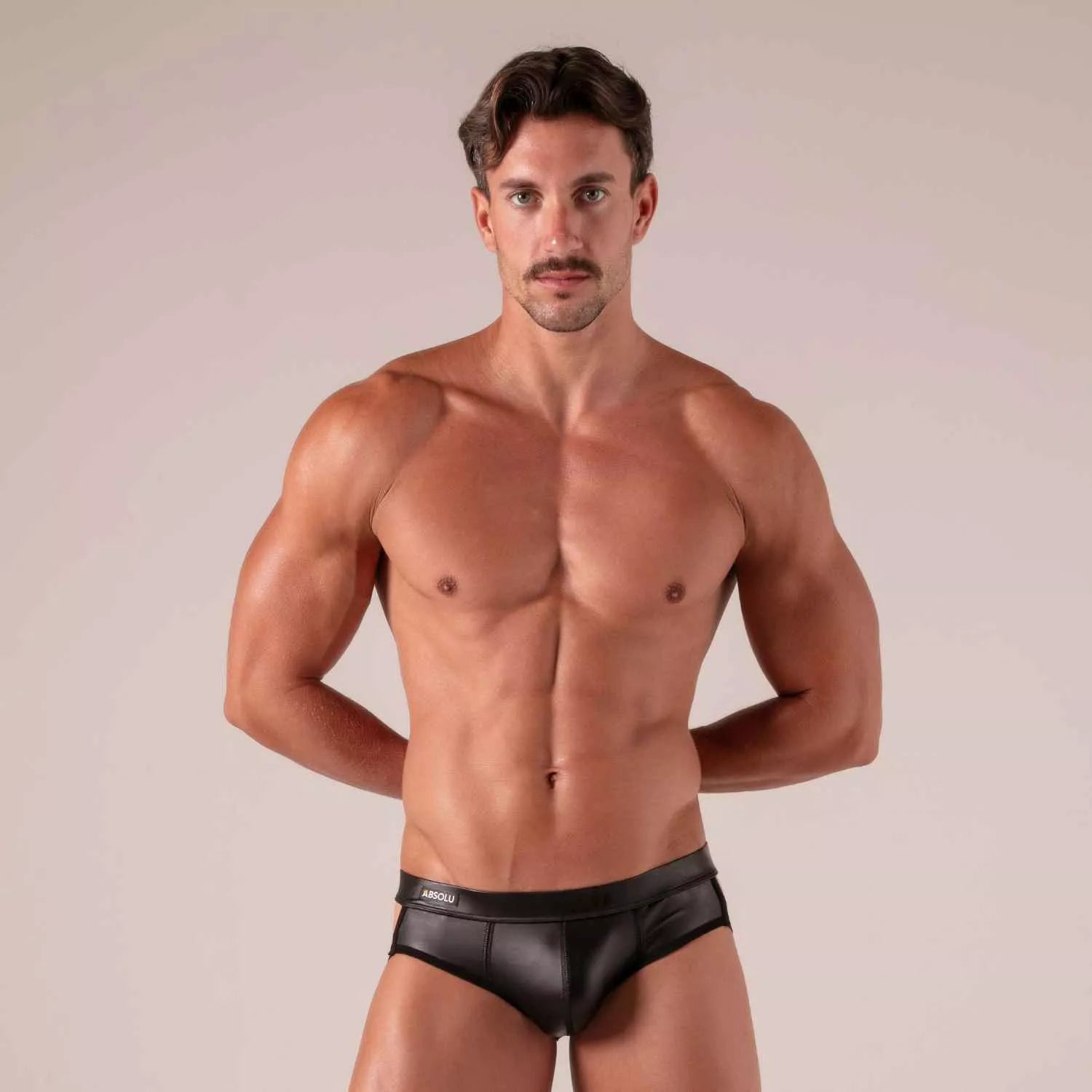 Black leather master straps jock brief with sleek form-fitting design and abscu embroidered waistband