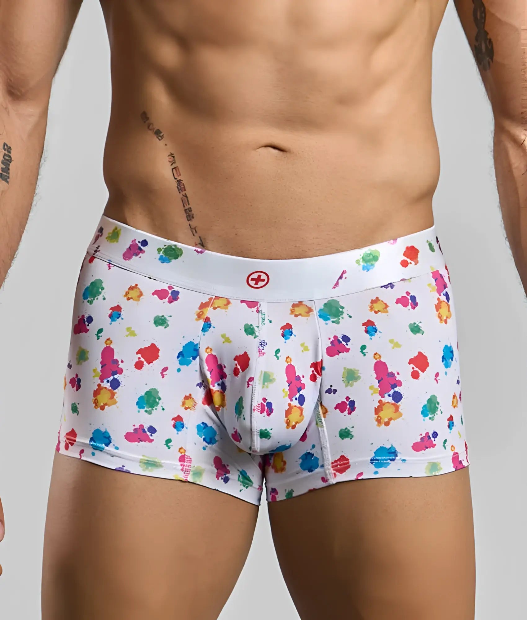 Malebasics trunk hipster white splash boxer briefs with vibrant multicolored paint splatter and red cross waistband