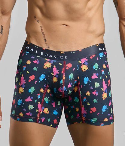 Men’s navy blue malebasics boxer briefs with multicolored paint splatter and red stitching along the seams