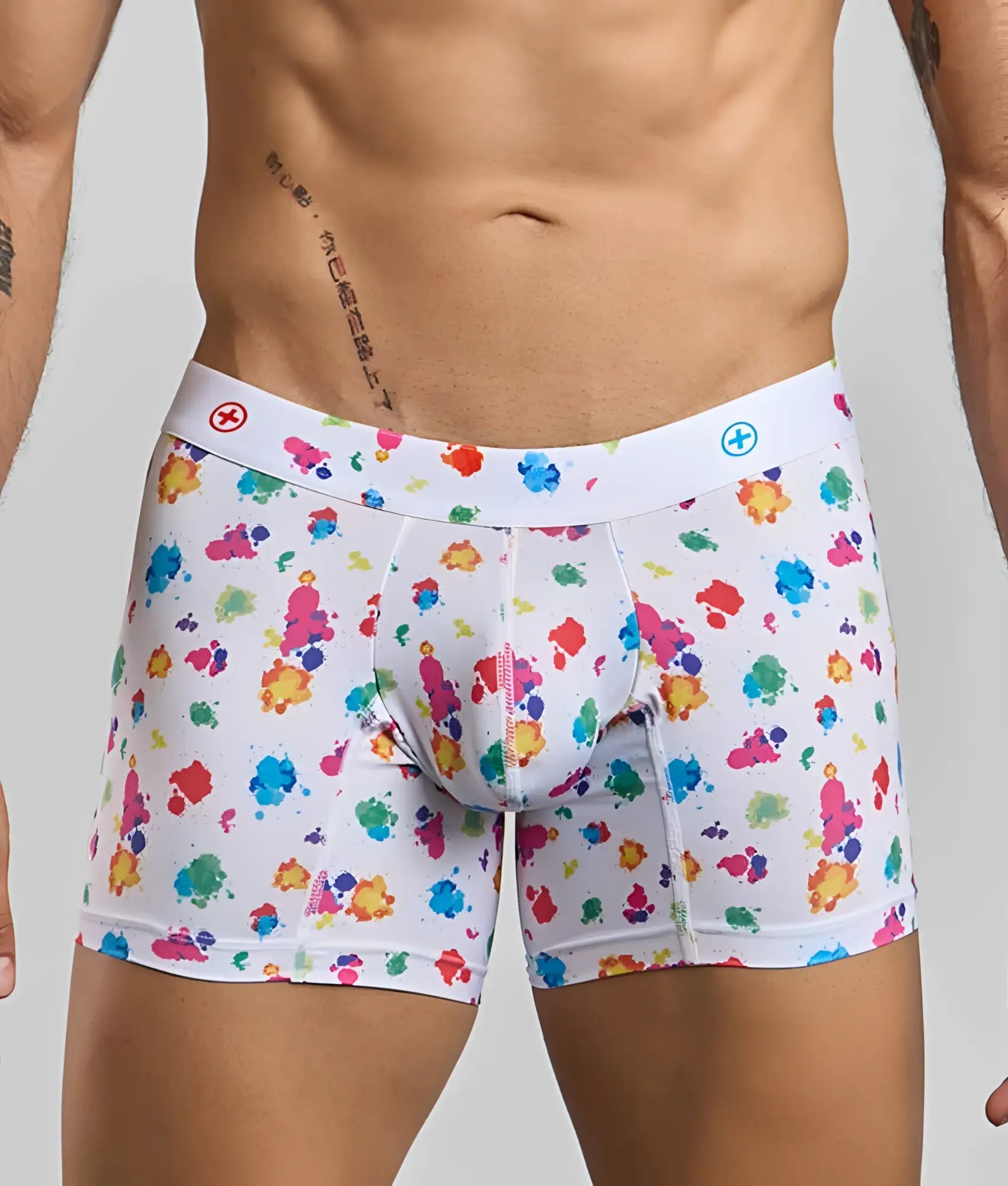 White boxer briefs malebasics hipster black splash with vibrant multicolored paint splatter pattern front view