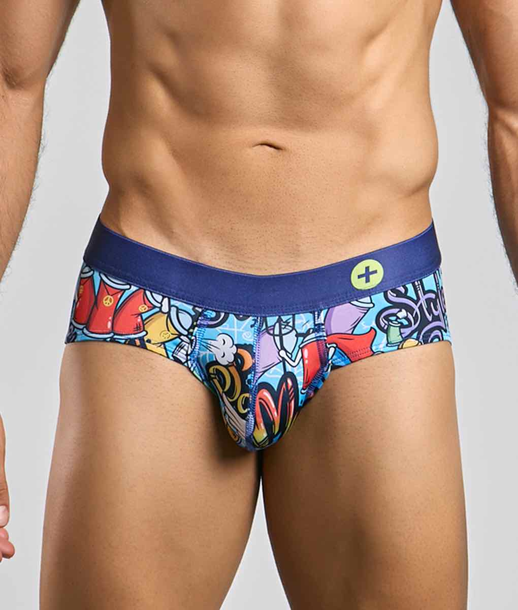 Malebasics hipster brief with vibrant graffiti print and navy blue waistband featuring a small yellow circular logo