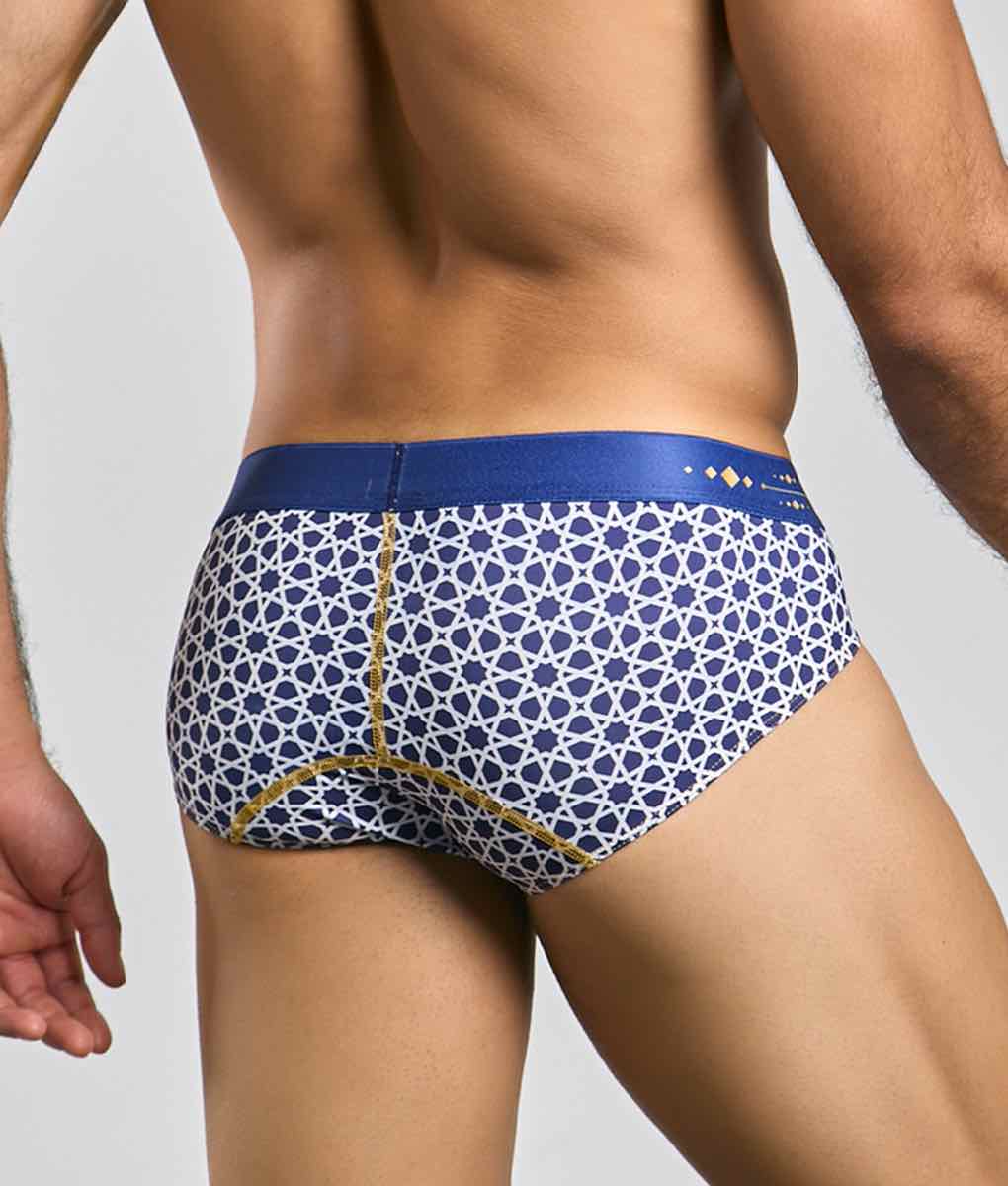 Malebasics hipster brief featuring blue and white patterned fabric with gold trim for comfortable daily wear