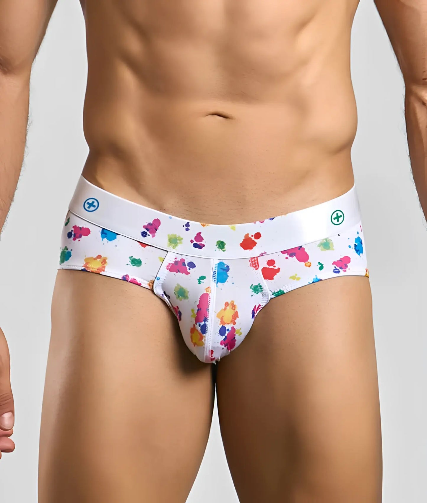 Malebasics new hipster brief white splash featuring vibrant multicolored paint splatter and subtle waistband logo