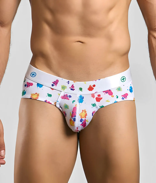 Malebasics new hipster brief white splash featuring vibrant multicolored paint splatter and subtle waistband logo