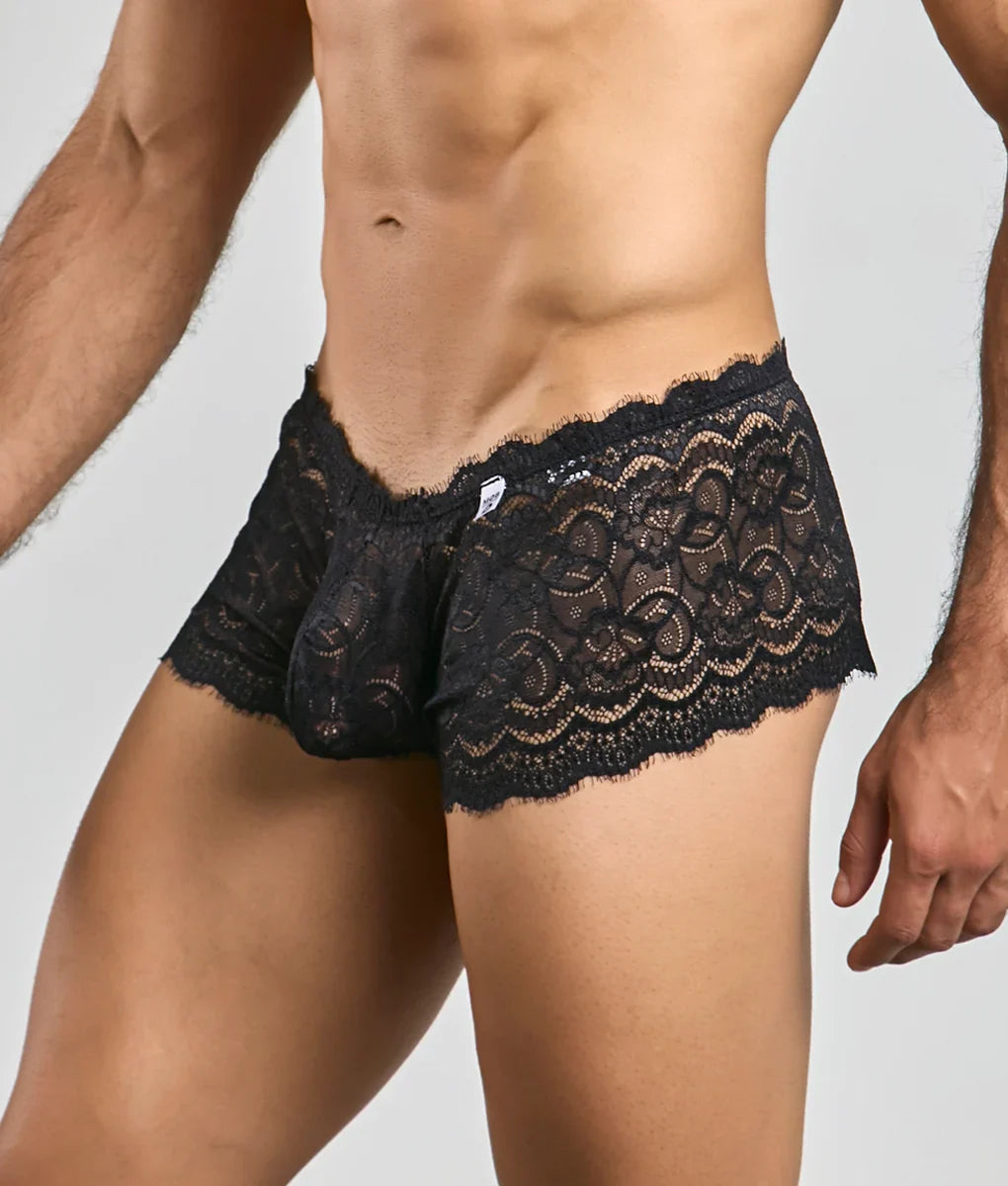 Black lace boxer shorts with intricate floral patterns and scalloped edges in a rose design for men