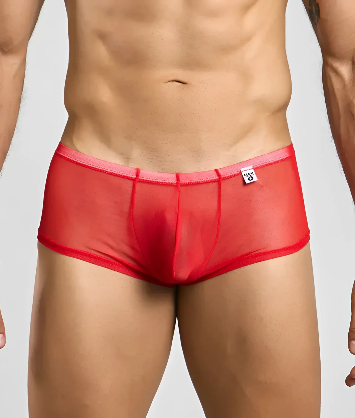 Mob men’s sexy sheer hip brief in red sheer mesh with solid waistband and small white brand tag visible