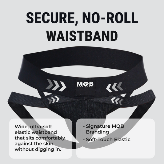 Men’s x jockstrap with black elastic waistband featuring white arrow graphics and mob eroticwear branding back side view