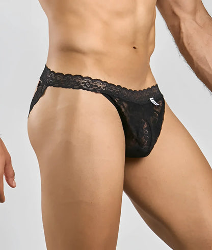 Black lace thong with intricate floral patterns and scalloped waistband in MOB men’s lace jockstrap design
