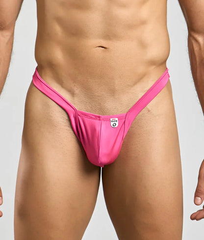 Bright pink sleek form-fitting mob y buns thong made from smooth stretch fabric with small white brand tag at center back