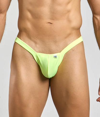Bright neon green mob y buns thong made of smooth stretchy fabric with small white brand tag at center front