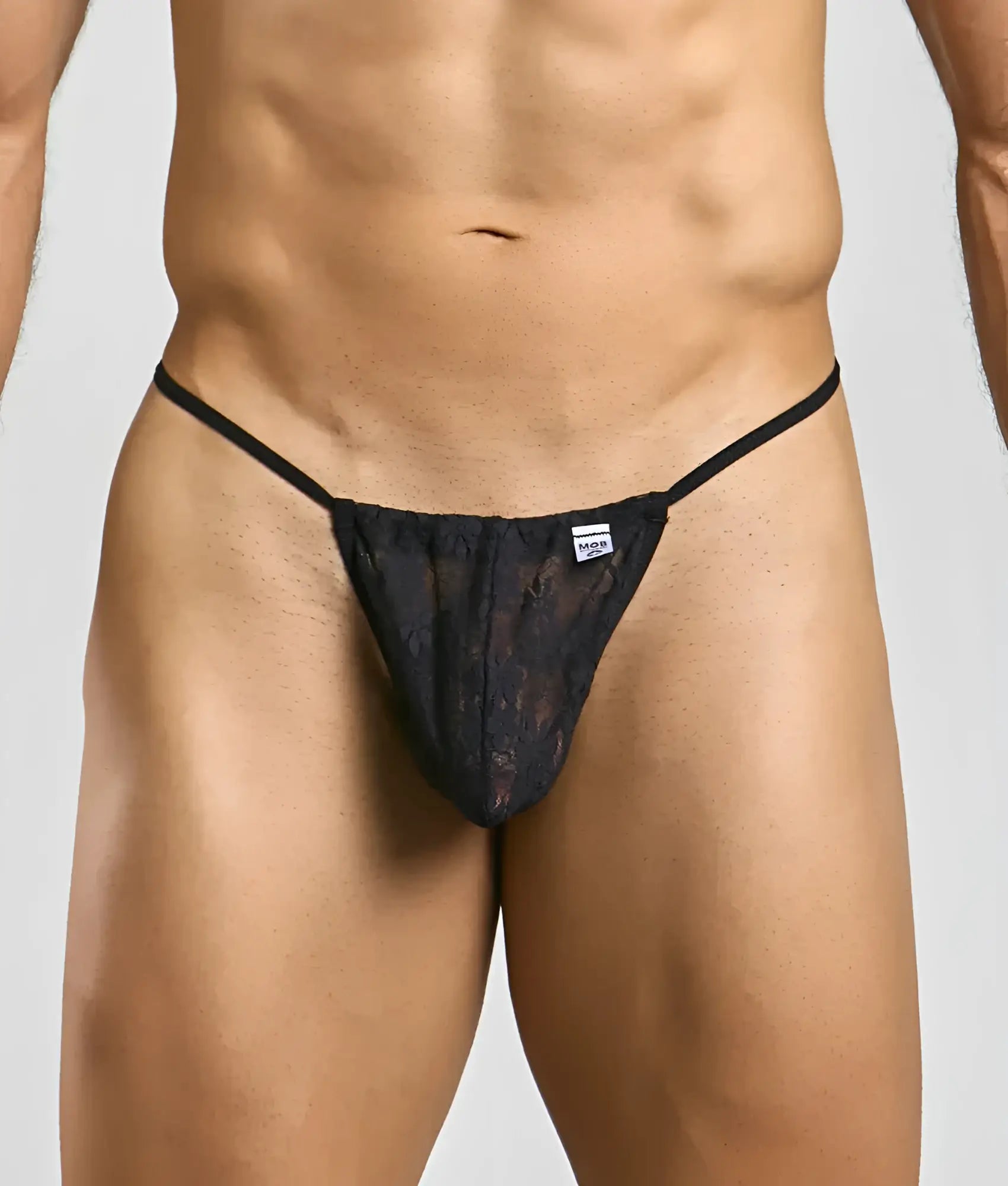 Black lace thong g-string with thin straps and a small brand tag at the waistband in mob print design