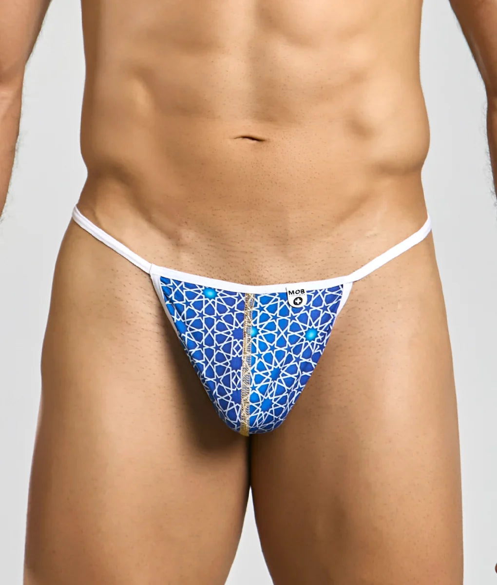 Blue patterned MOB hipster T thong with white trim and gold zipper featuring intricate geometric design