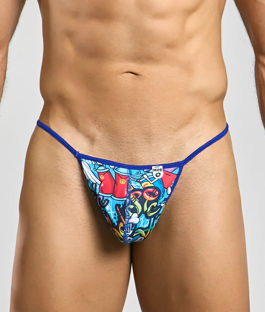Vibrant blue and multicolored graffiti patterned hipster t thong with royal blue waistband featuring mob logo