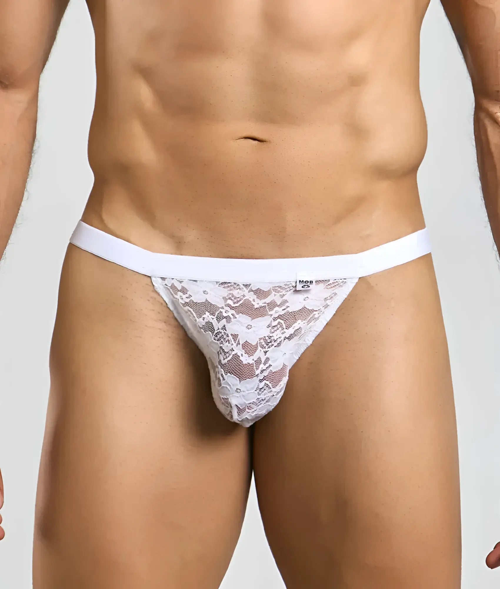 White lace thong jockstrap with solid white waistband featuring mesh and lace detailing in a sexy design