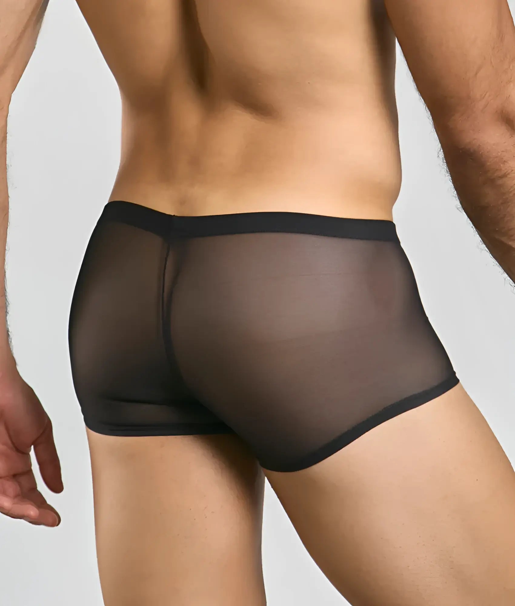 Men’s mesh lace pouch trunk in black sheer mesh with a solid black waistband front view