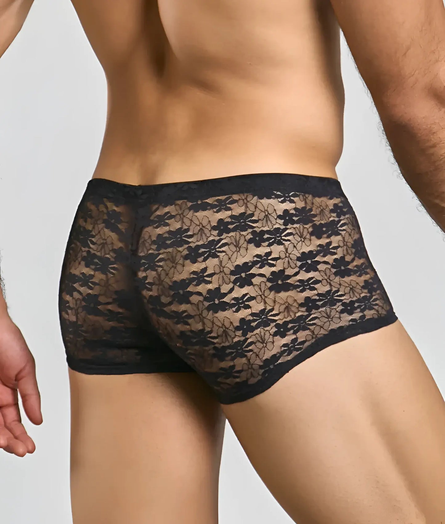 Mens mesh lace pouch trunk featuring black floral lace briefs with sheer patterned design and solid black waistband