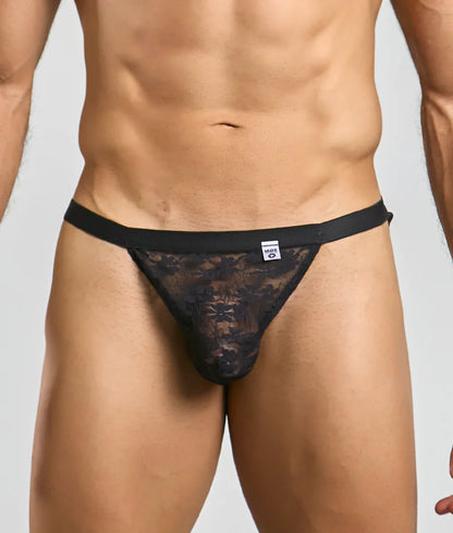 Black lace MOB Y sexy thong with a solid black waistband and floral pattern shown from the back side
