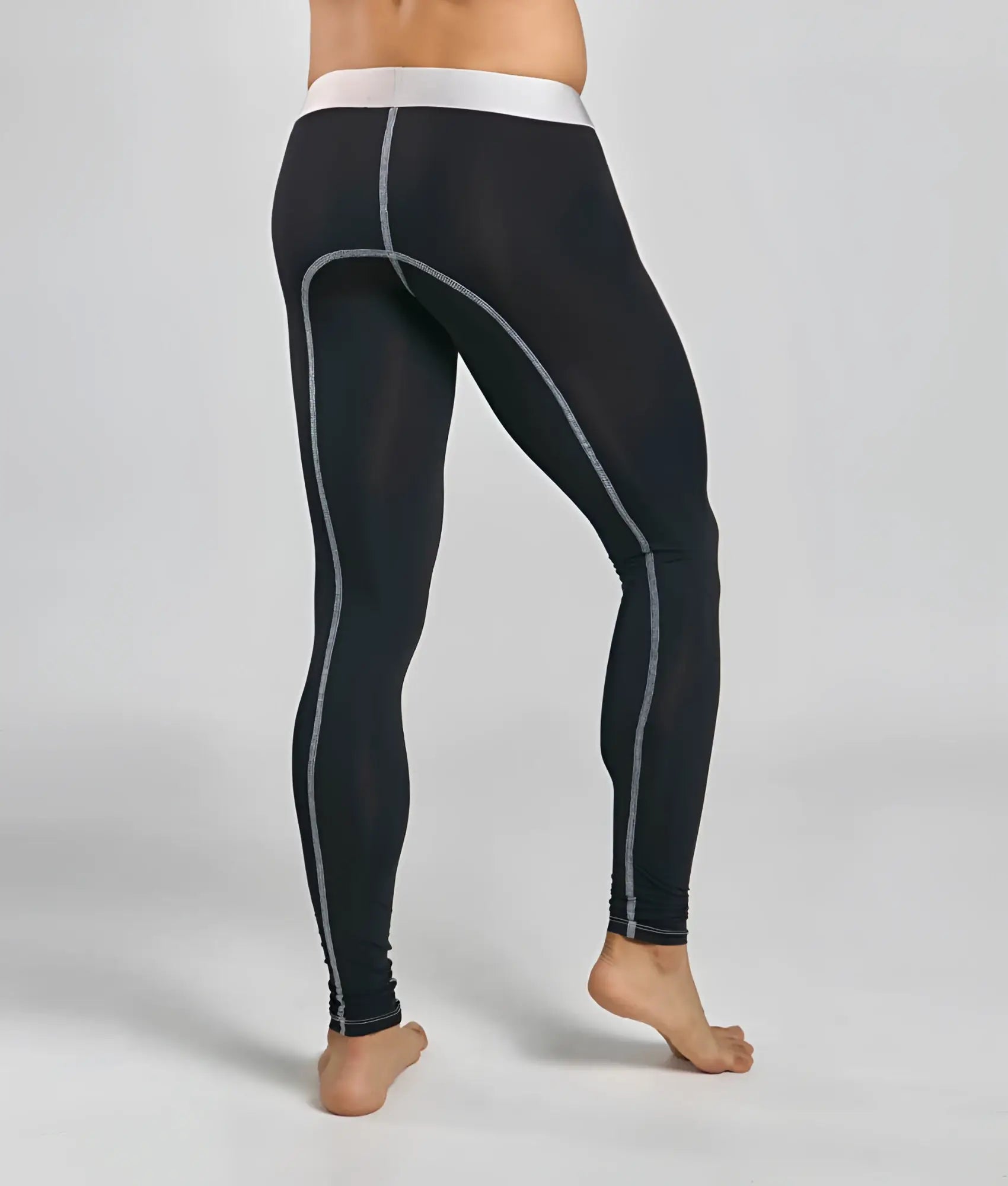Black microfiber malebasics longjohn leggings with white elastic waistband and gray side stitching for athletic use