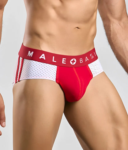 Red and white male basics spot brief with perforated side panel and bold brand name on the waistband