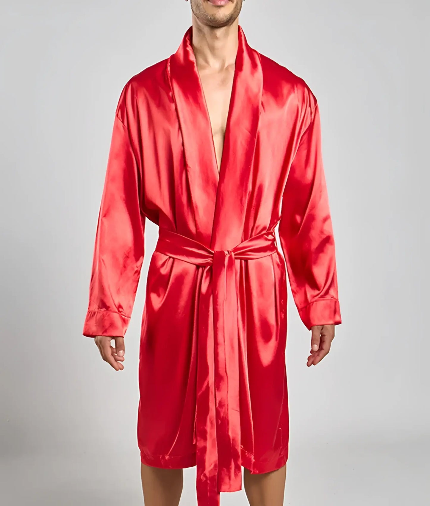 A vibrant red satin robe with a matching belt and long sleeves in a classic wrap design by malebasics