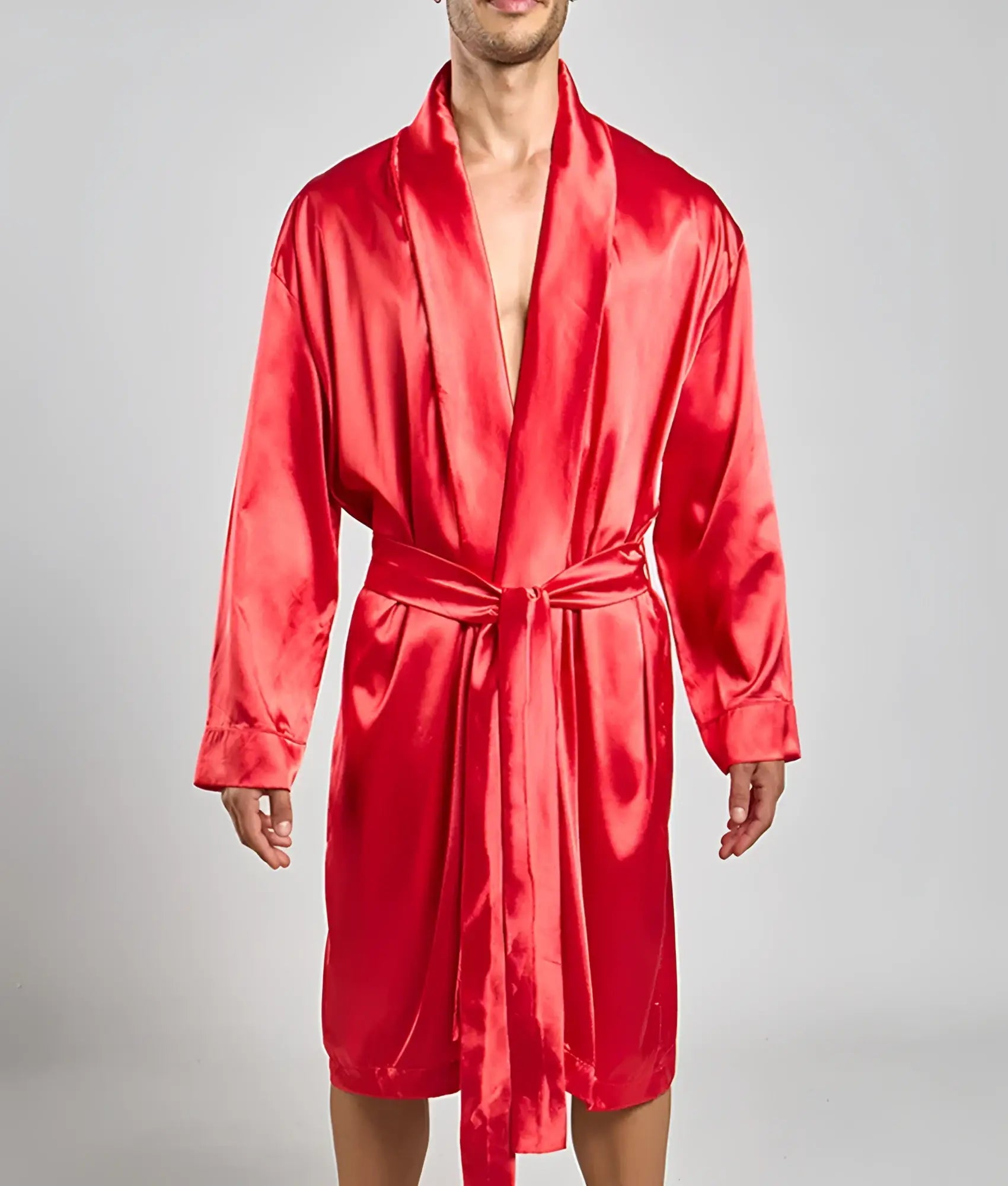 A vibrant red satin robe with a matching belt and long sleeves in a classic wrap design by malebasics