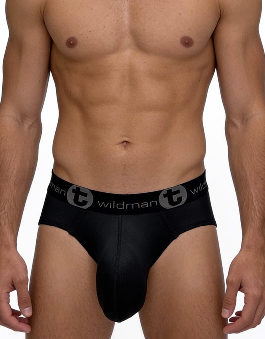 Black WildmanT mesh brief with a contoured pouch and a branded elastic waistband on a fit male model.