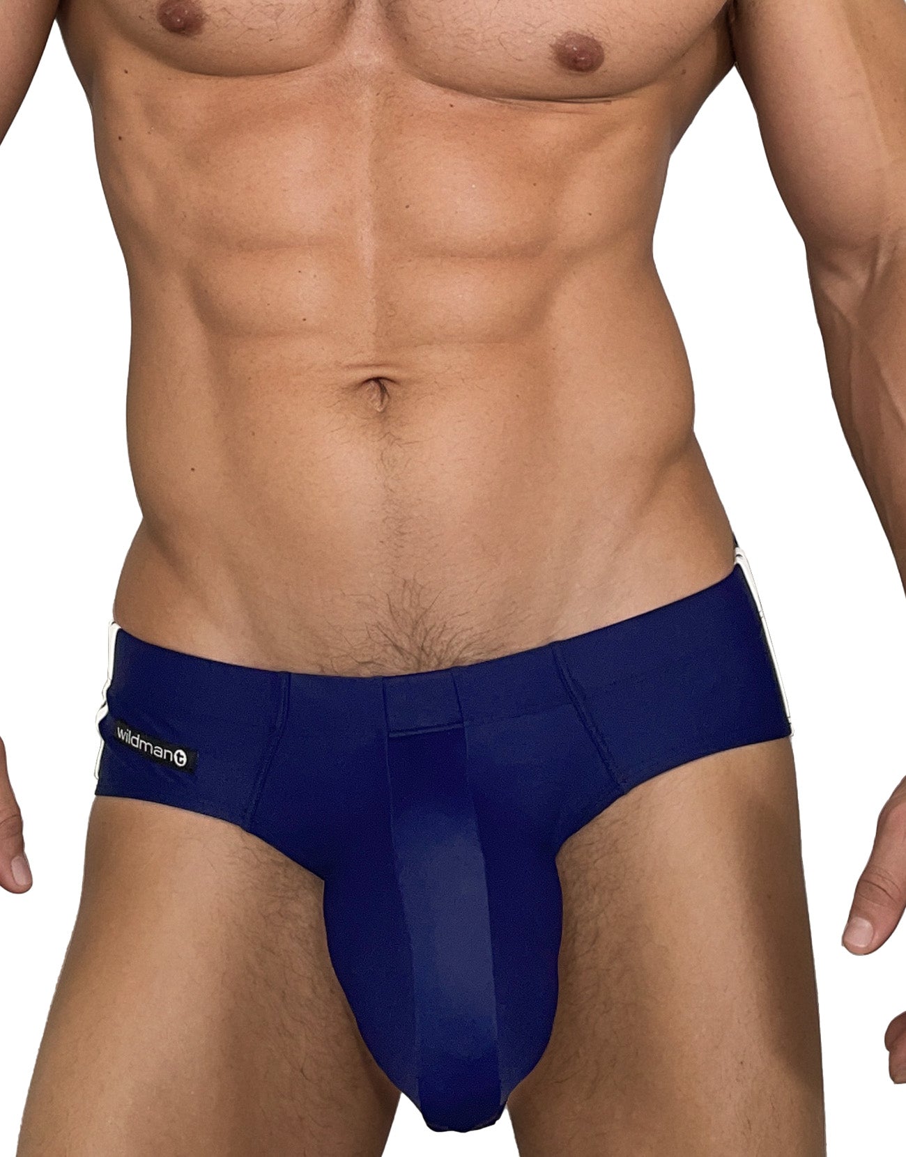 Navy blue WildmanT swim brief with a contoured pouch, low-rise fit, and small brand logo tag on the side hip.