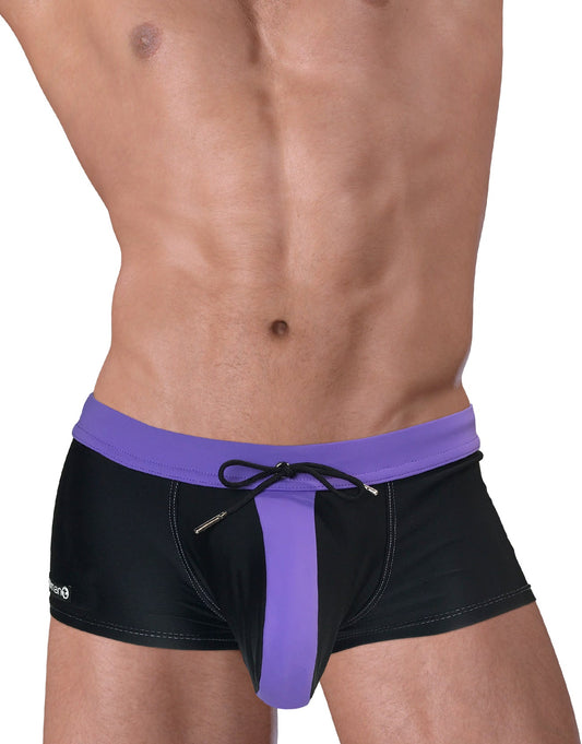 Black square-cut swim trunks with a purple waistband, vertical center pouch panel, and black drawstring.