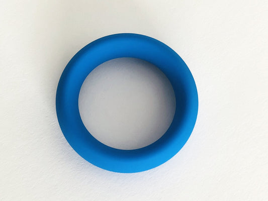 A solid blue silicone ring with a smooth matte finish from meat rack designed for durable everyday wear