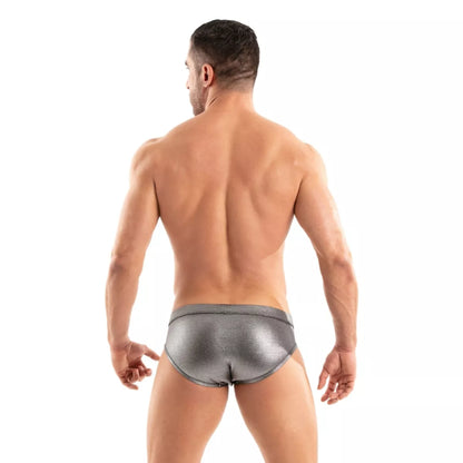 Shiny metallic silver meatal swim brief with a sleek form-fitting design made of reflective material