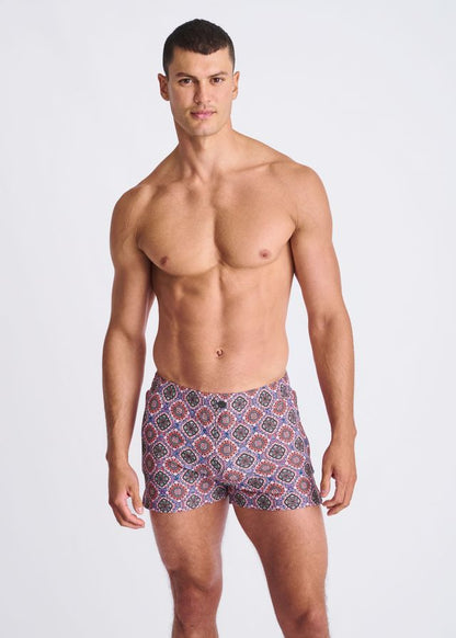 Medallions seersucker swim shorts with mesh lining featuring vibrant purple red and blue geometric patterned fabric