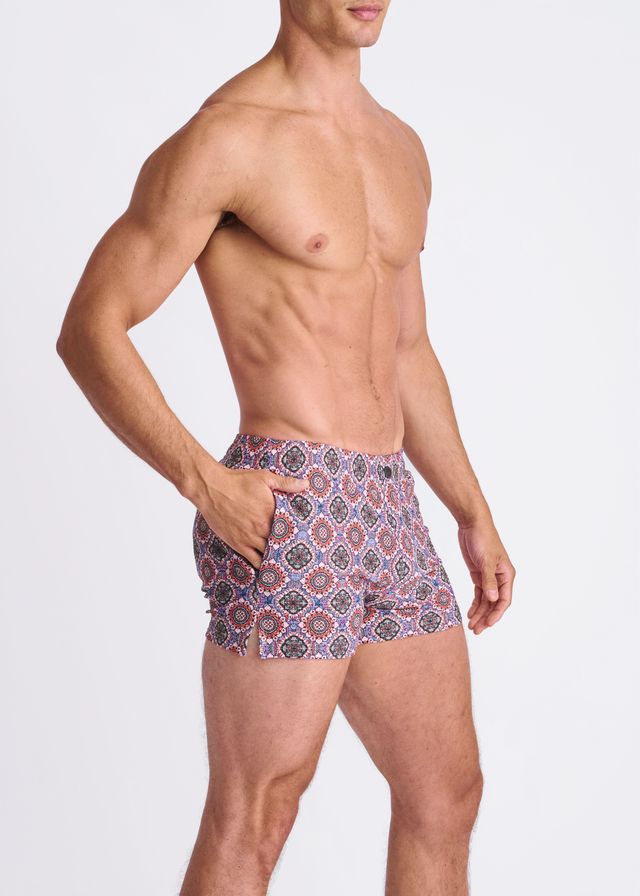 Medallions seersucker swim shorts with mesh lining in vibrant purple red and gray geometric patterned design