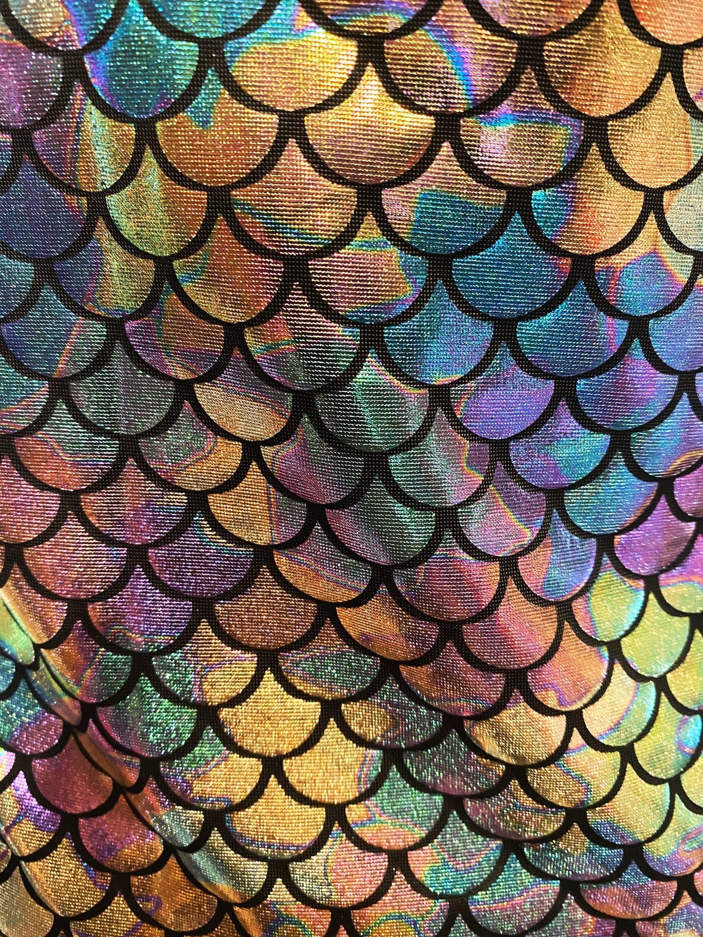 Merman tank featuring iridescent holographic mermaid scale fabric with black outlined scales for eye-catching style