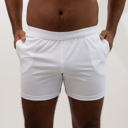 White athletic mesh back short with textured fabric and subtle side panel detailing for sports and workouts
