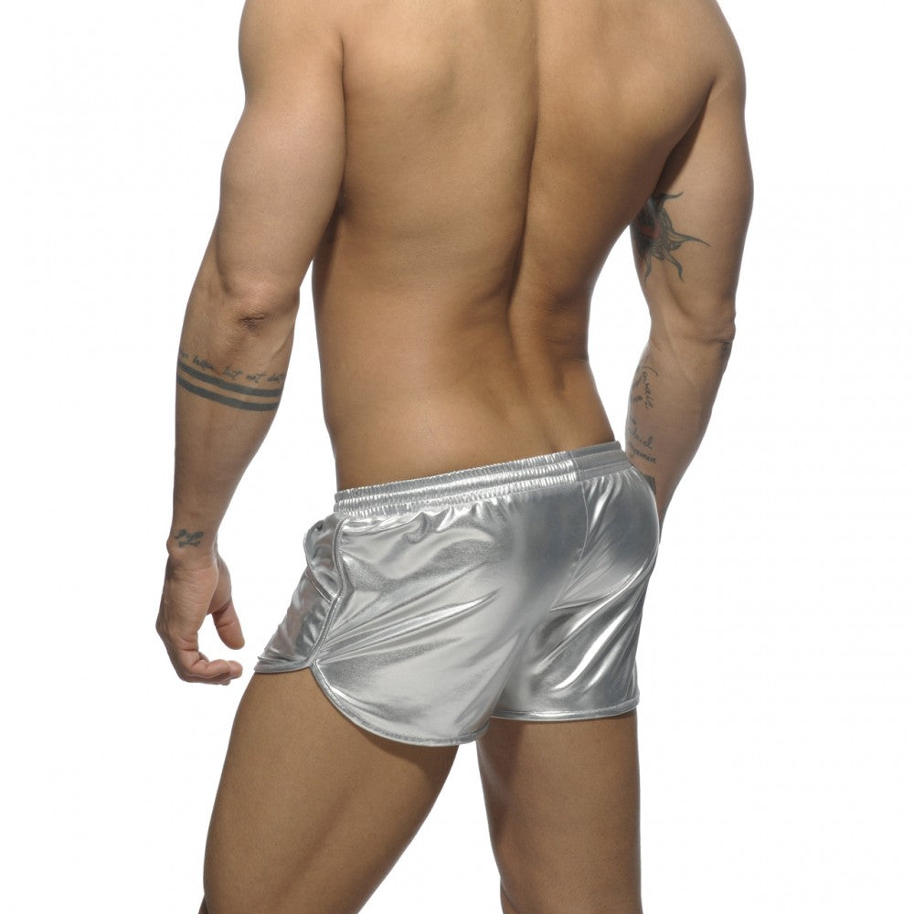 Shiny silver metallic shorts with a sleek form fitting design from the metallic short collection